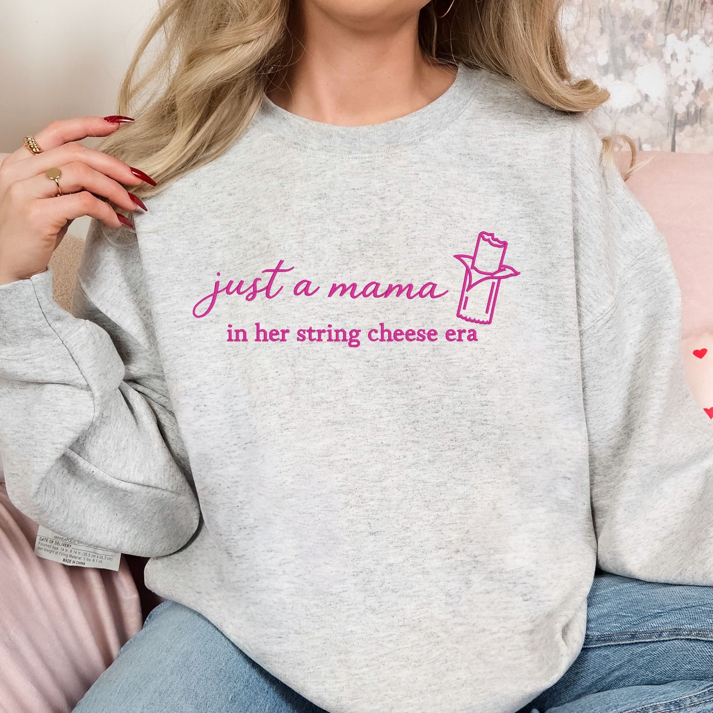 Woman wearing mama embroidered crewneck sweatshirt