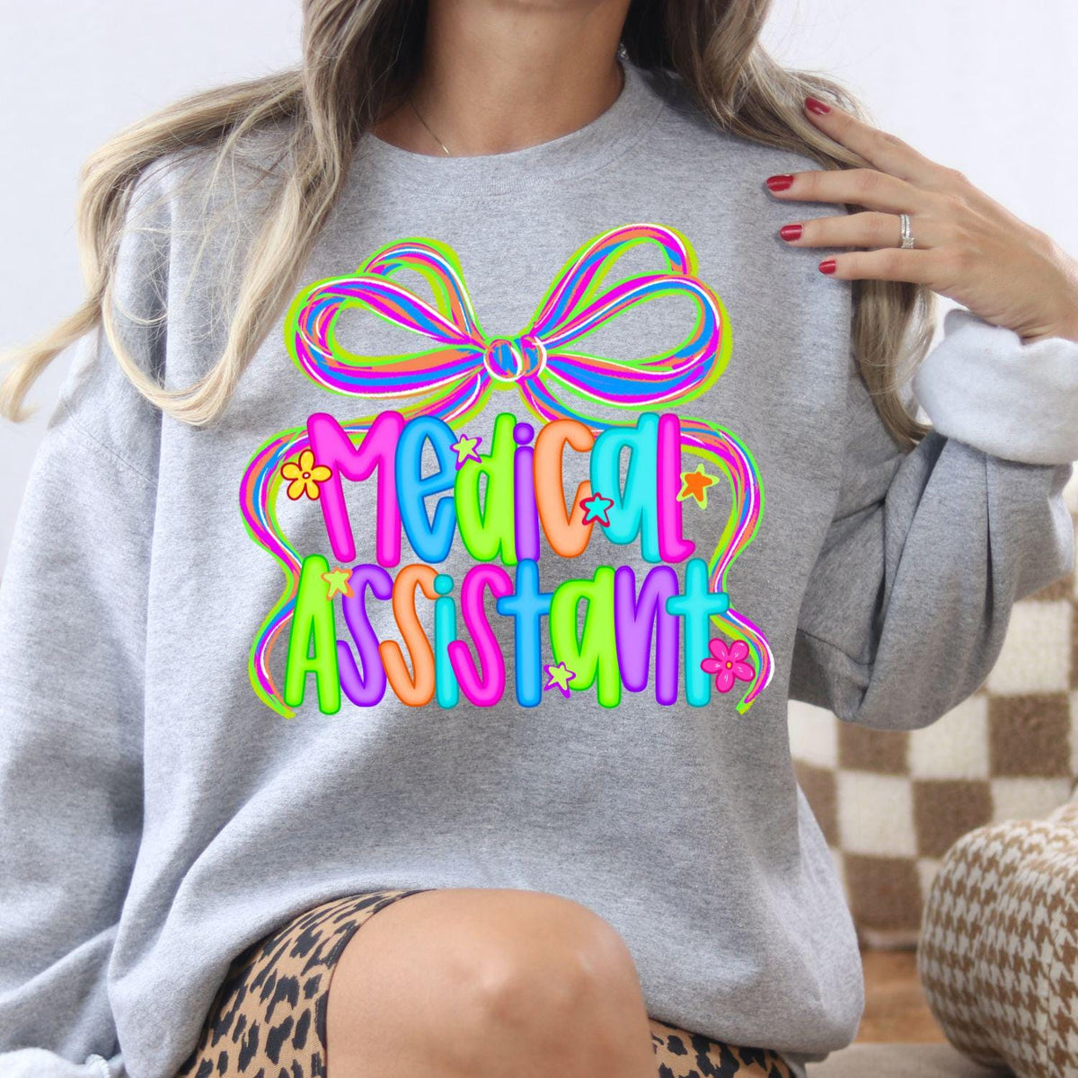 Sport gray neon Medical Assistant sweatshirt modeled indoors