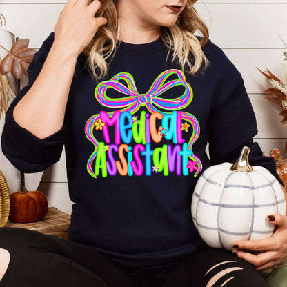 Navy Medical Assistant bow sweatshirt modeled while holding a white pumpkin