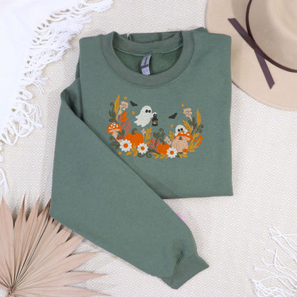 Military Green floral ghost and pumpkin embroidered sweatshirt cozy flat lay