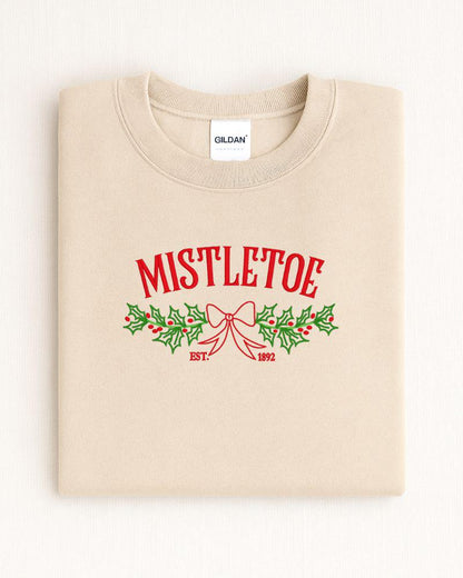 Gildan holiday crewneck featuring delicate machine embroidered mistletoe