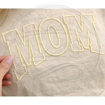 Close up puff embroidery detail on cream Comfort Colors mom shirt