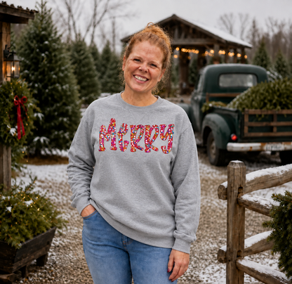 Multicolor sequin MERRY appliqué on a Sport Grey Gildan Softstyle sweatshirt