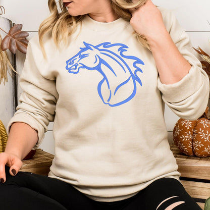 Sand sweatshirt with full-front blue Mustang horse embroidery modeled indoors