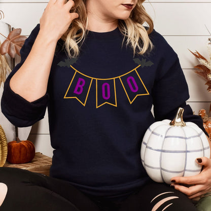 Woman wearing Navy BOO banner applique Halloween sweatshirt