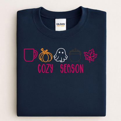 Navy Gildan sweatshirt embroidered with colorful Cozy Season fall icons