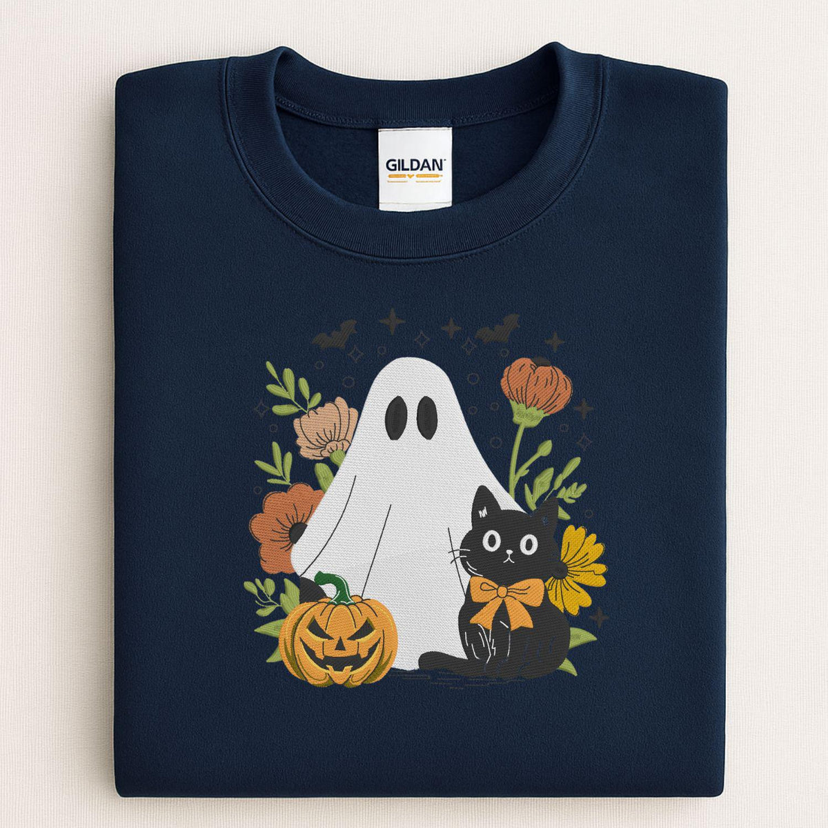 Folded Navy sweatshirt with ghost, black cat, pumpkin and floral embroidery