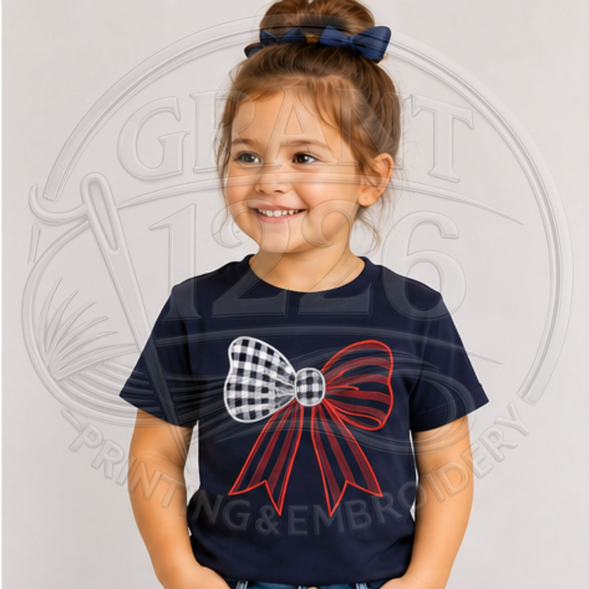 Child wearing Navy embroidered red, white, and blue gingham bow shirt