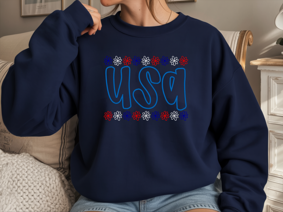 Navy Gildan USA embroidered crewneck with red, white, and blue daisy borders