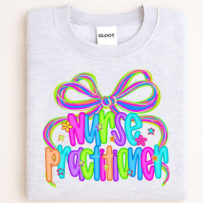 Folded ash gray crewneck with colorful Nurse Practitioner bow design
