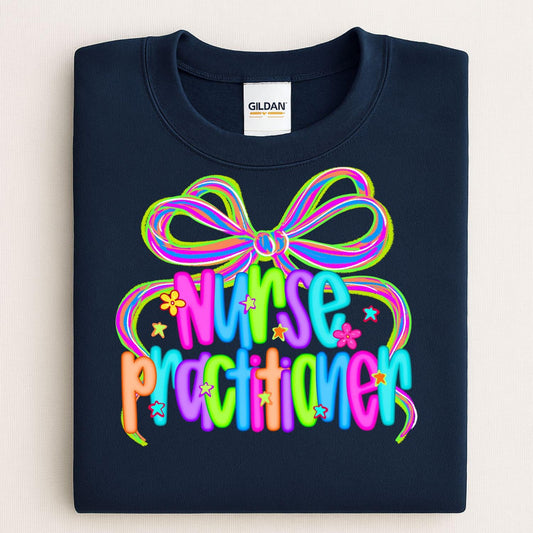 Folded navy sweatshirt with colorful Nurse Practitioner bow graphic