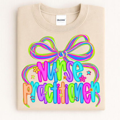 Folded sand crewneck with colorful Nurse Practitioner bow design