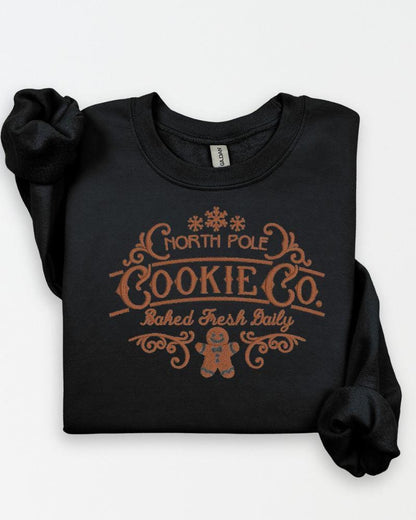North Pole Cookie Co. embroidered Christmas sweatshirt in Black