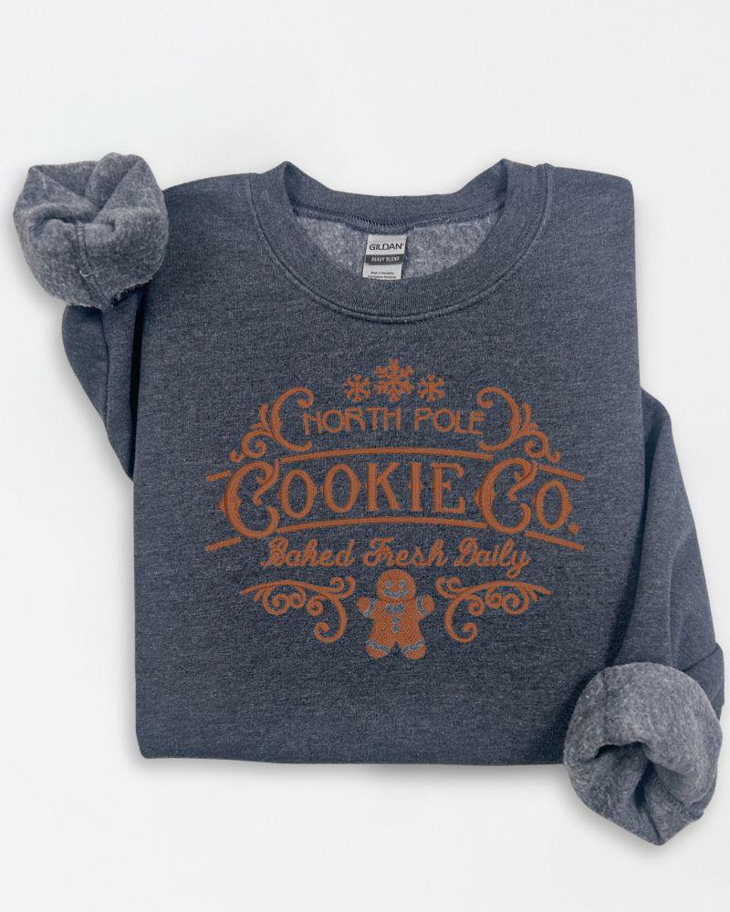 North Pole Cookie Co. embroidered Christmas sweatshirt in Dark Heather