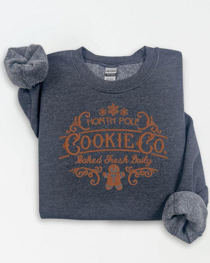 North Pole Cookie Co. embroidered Christmas sweatshirt in Dark Heather