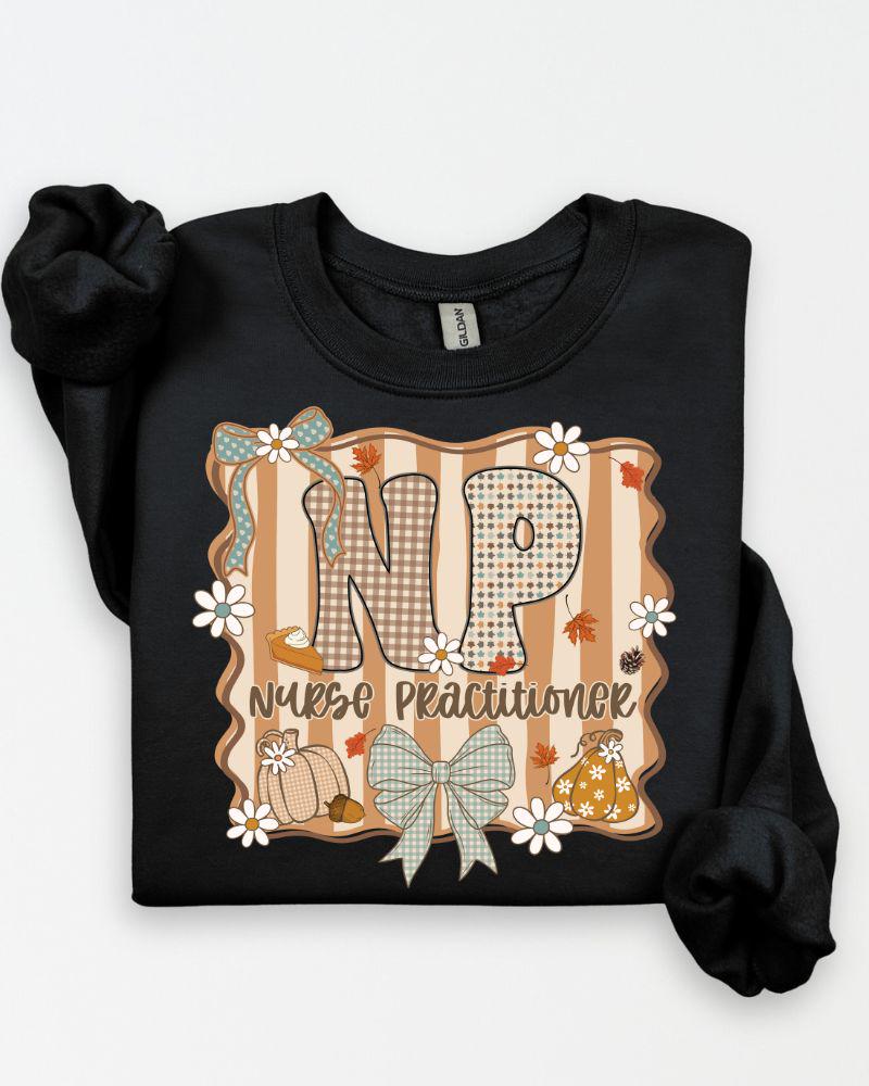Navy Gildan Heavy Blend sweatshirt with fall NP Nurse Practitioner pumpkin and bow graphic