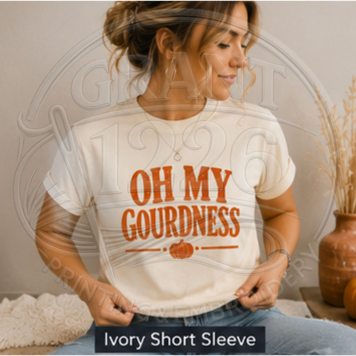 Woman wearing ivory Oh My Gourdness Comfort Colors fall pumpkin T-shirt