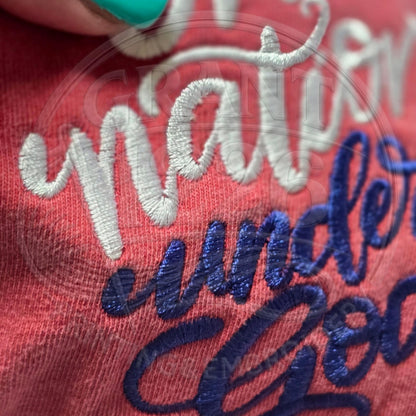 Close-up of red, white and blue One Nation Under God embroidery