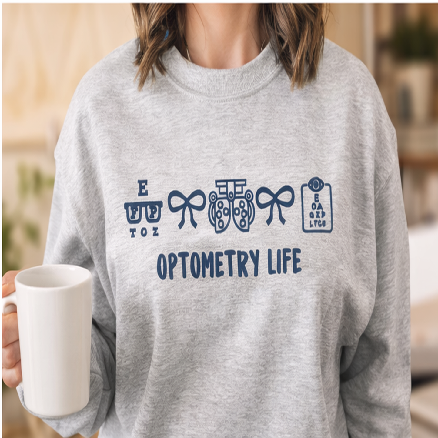 Ash gray optometrist gift sweatshirt with embroidered design