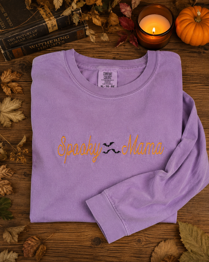 Orchid Comfort Colors long sleeve Spooky Mama embroidered Halloween shirt flat lay