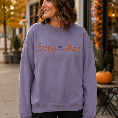 Paragon Spooky Mama embroidered Halloween sweatshirt lifestyle mockup outside a coffee shop