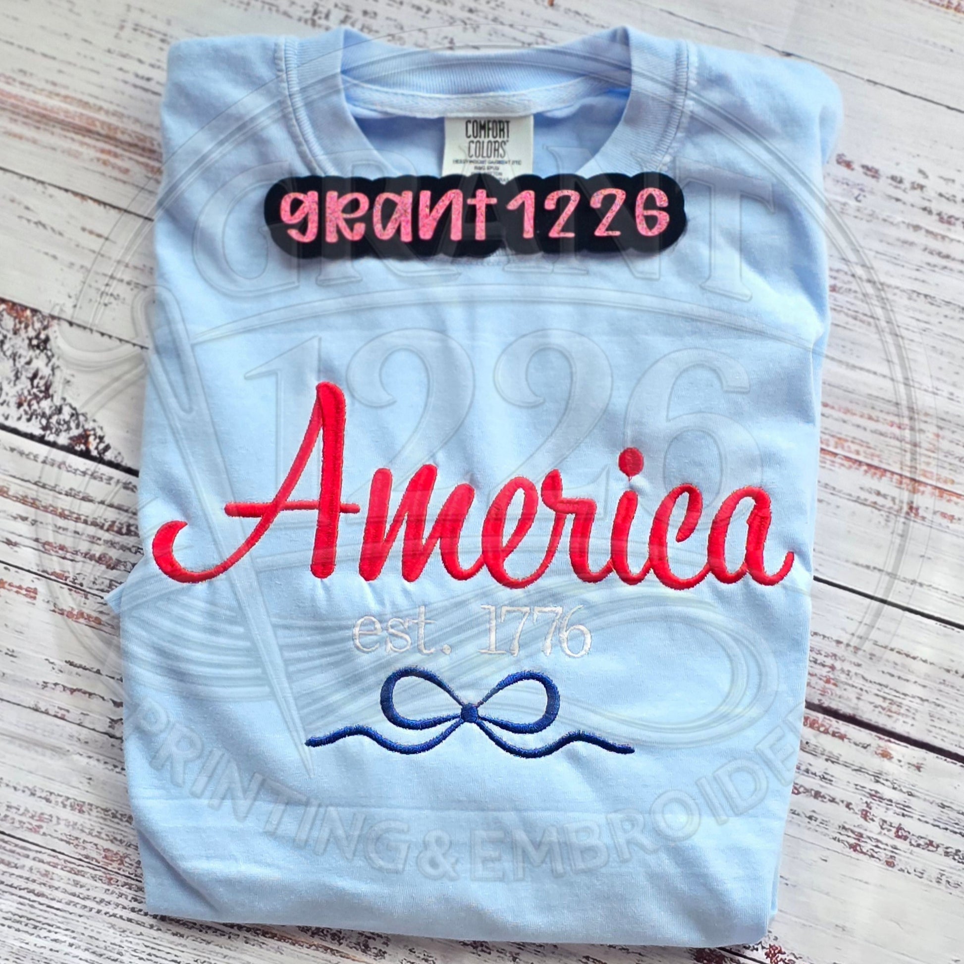 Embroidered America Est 1776 shirt on  Comfort Colors tee