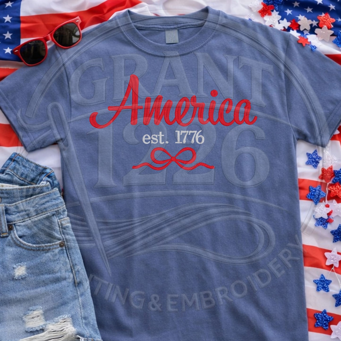 Patriotic America shirt flat lay with jeans and USA flag theme