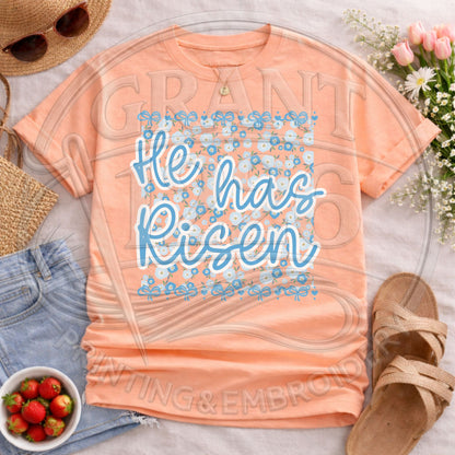 Peach pastel “He Has Risen” Christian graphic tee
