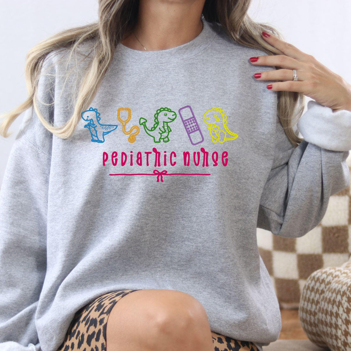 Pediatric nurse dinosaur embroidered sweatshirt – product image 1