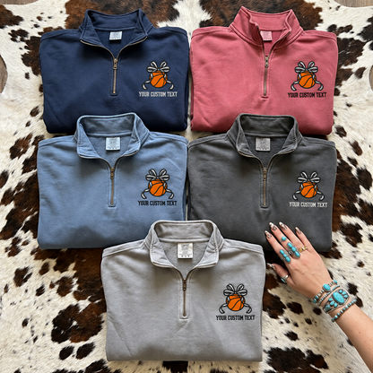 Five Comfort Colors quarter zips with personalized basketball bow embroidery in True Navy Crimson Blue Jean Pepper and Grey