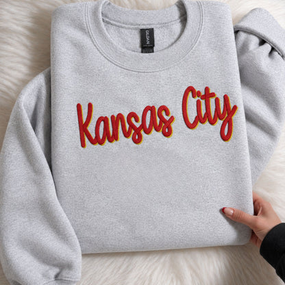 Personalized shadow embroidered crewneck sweatshirt in ash gray featuring custom script embroidery. 