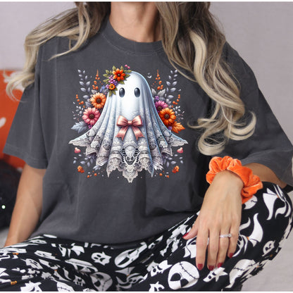 Close-up of a pink bow lace ghost and autumn flowers printed on a Pepper Comfort Colors shirt