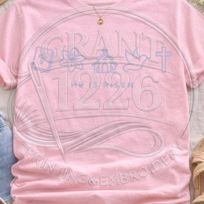 Blossom pink Comfort Colors He Is Risen Easter tee with pastel Christian faith icon design