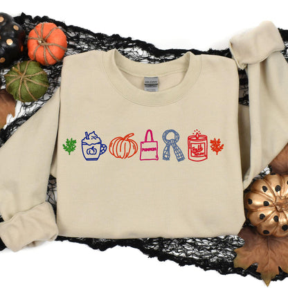 Sand embroidered fall sweatshirt styled with pumpkins and black lace