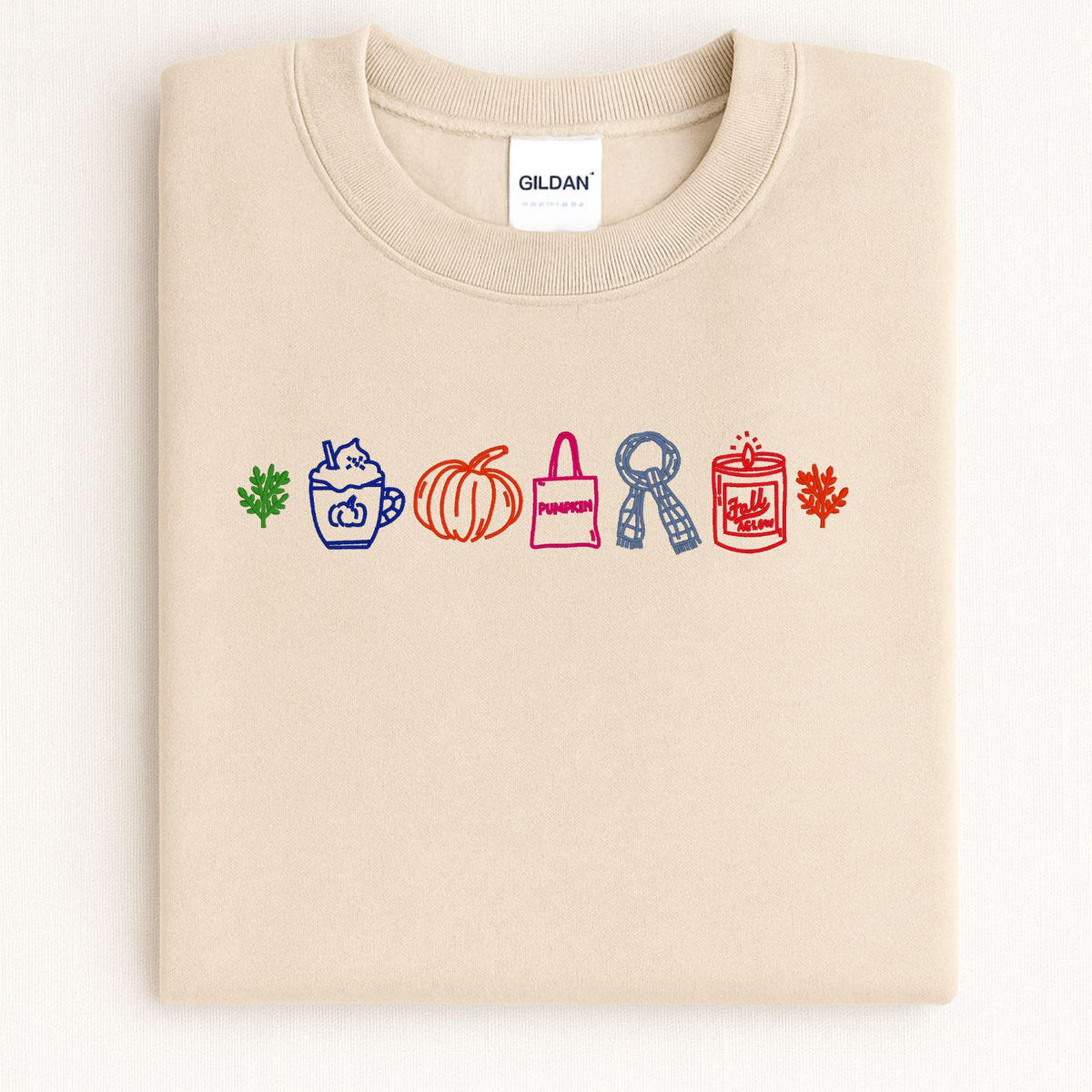 Sand fall icons embroidered crewneck folded for a front view