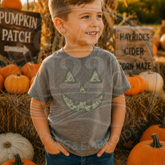 Child wearing Sport Grey camouflage jack-o-lantern Halloween shirt at pumpkin patch