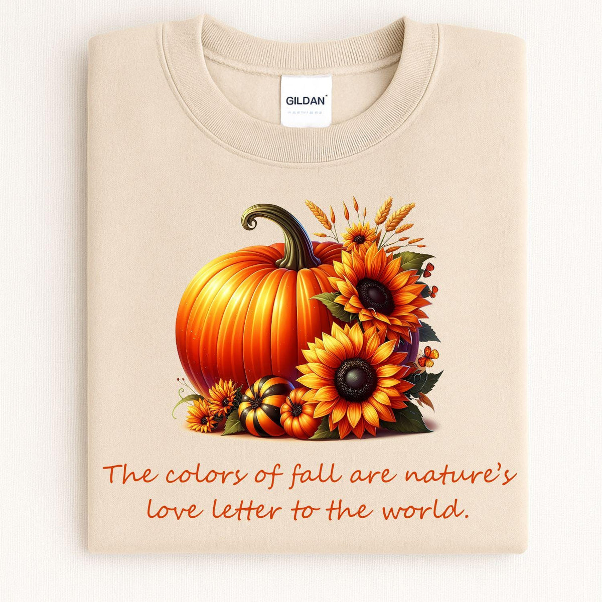 Sand fall pumpkin and sunflower crewneck folded for a front view