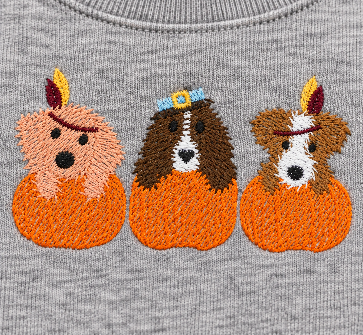 Close-up of Puppy Thanksgiving open sketch-stitch embroidery on Sport Grey sweatshirt