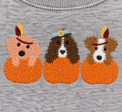 Close-up of Puppy Thanksgiving open sketch-stitch embroidery on Sport Grey sweatshirt