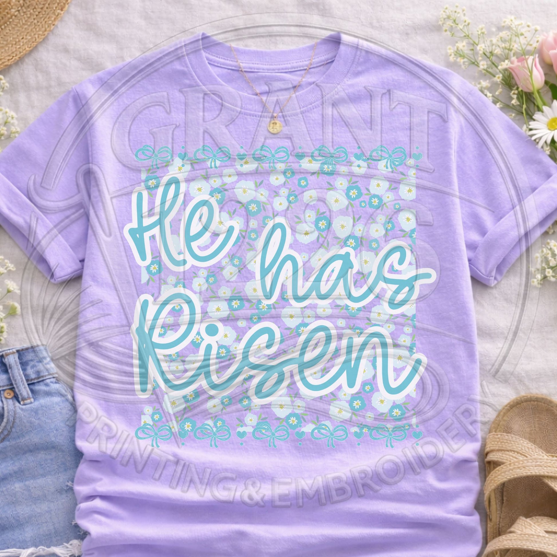 Purple floral “He Has Risen” Easter shirt