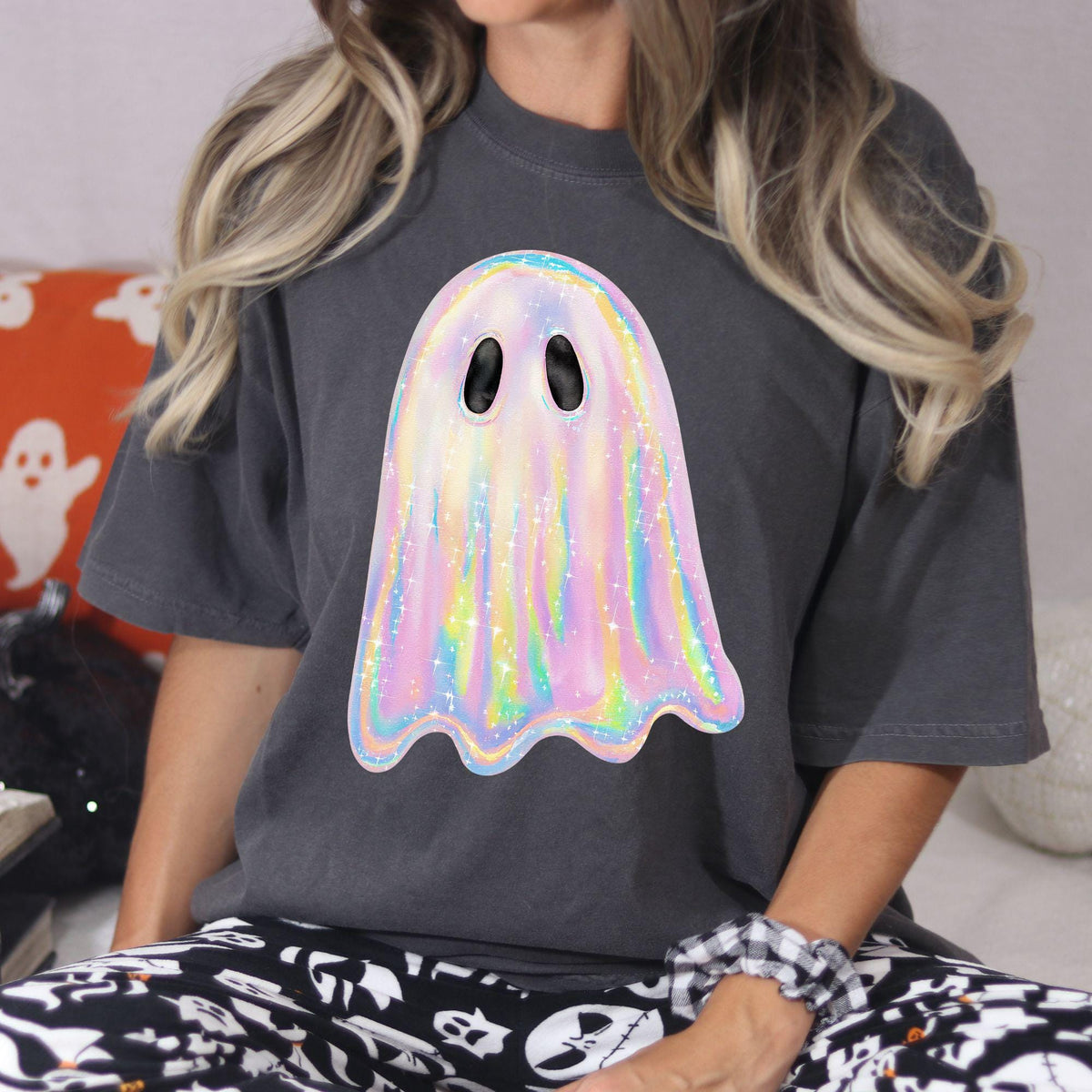 Front lifestyle view of charcoal T-shirt with colorful pastel ghost design