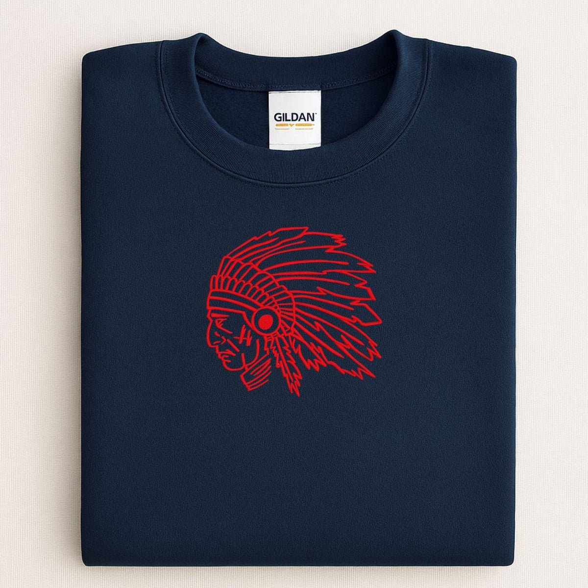Navy sweatshirt with a red embroidered headdress mascot folded for a front view
