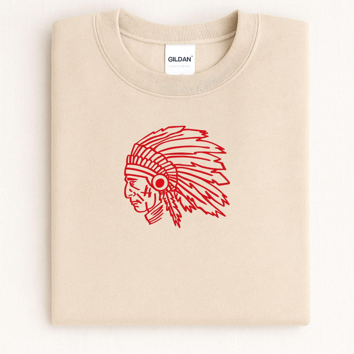 Sand headdress mascot embroidered sweatshirt folded on a light background