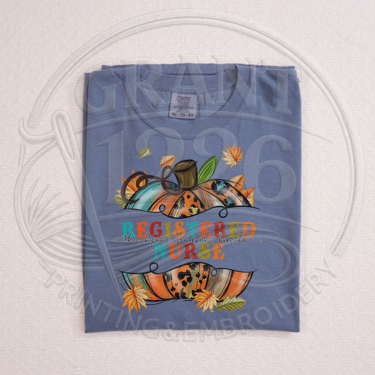 Blue Jean Comfort Colors Registered Nurse fall pumpkin shirt folded view