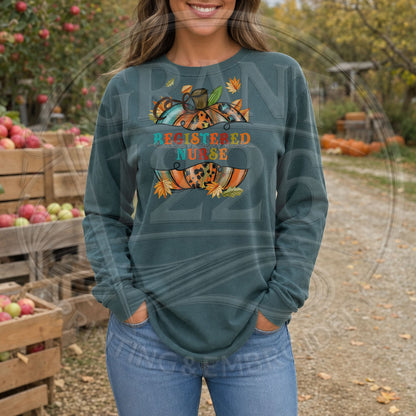 Blue Spruce Comfort Colors long sleeve Registered Nurse fall pumpkin shirt on model