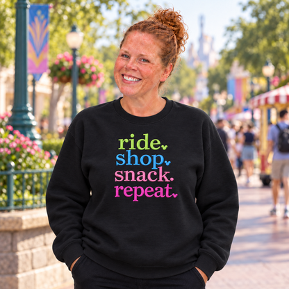 Woman wearing a Black Ride Shop Snack Repeat embroidered sweatshirt