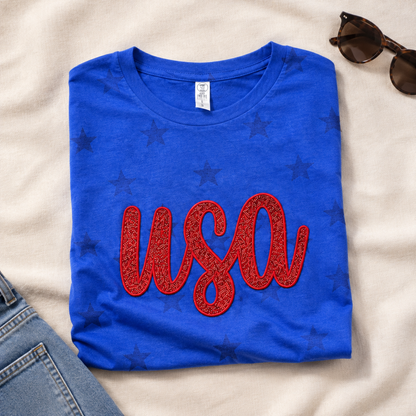 Royal blue patriotic star shirt with red glitter USA appliqué