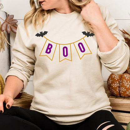 Woman wearing Sand BOO banner applique Halloween sweatshirt