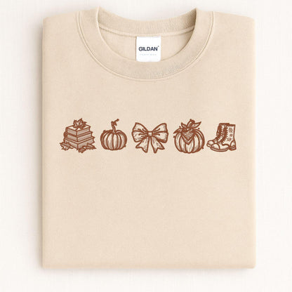 Sand Gildan sweatshirt with embroidered fall icons in brown thread