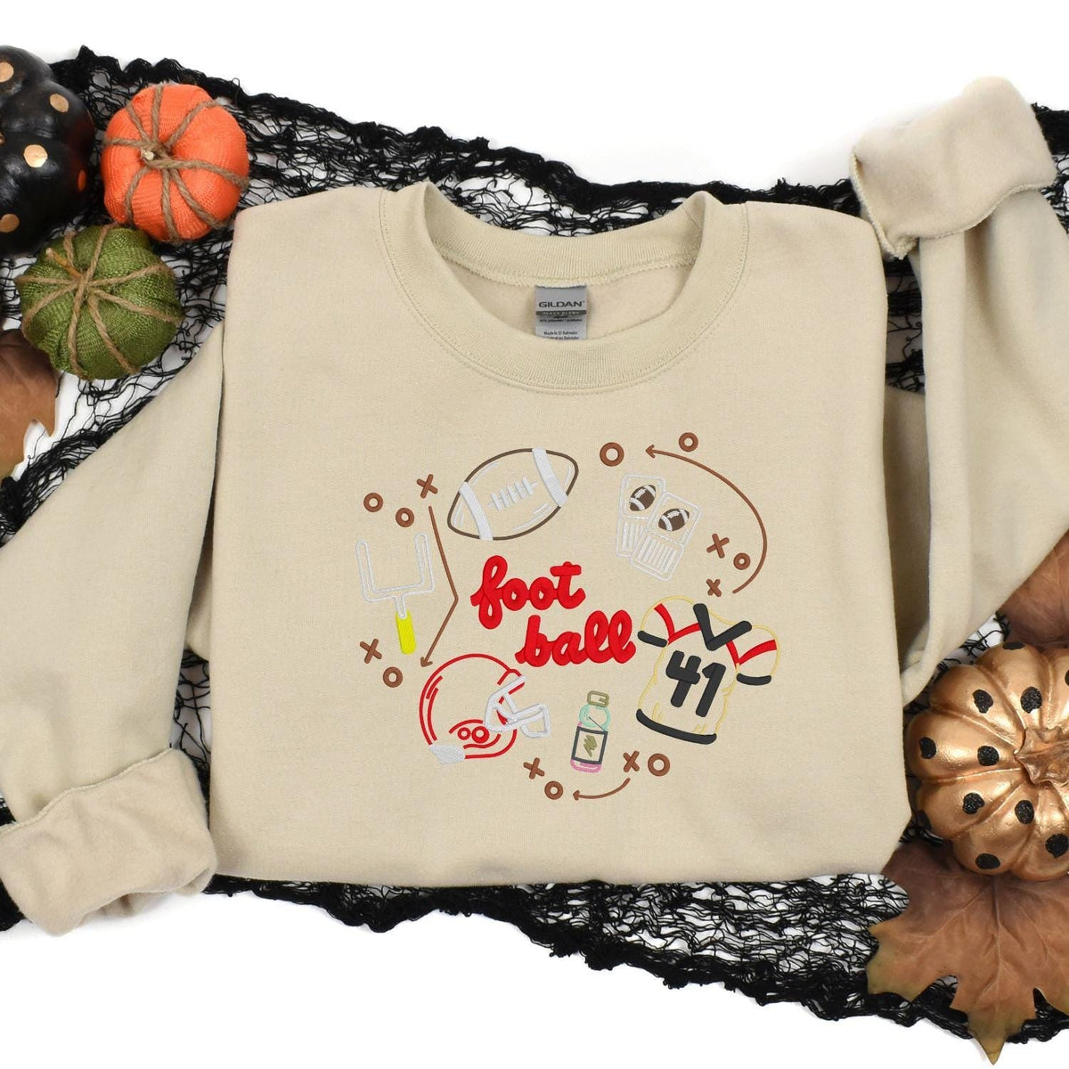 Sand embroidered football tailgate crewneck styled with fall pumpkins